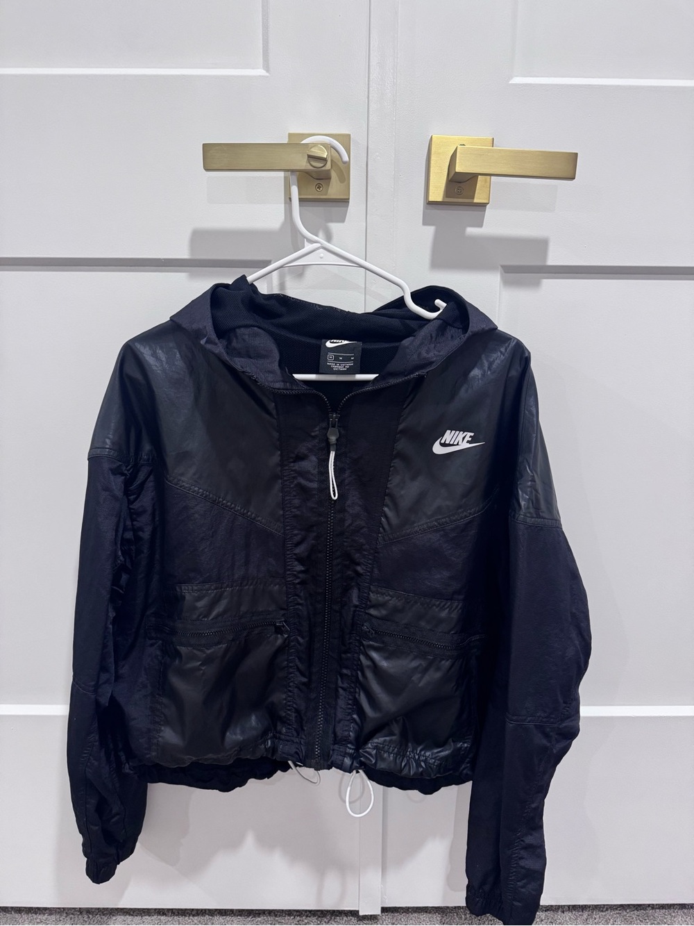 Nike Women's Black Hooded Rain Jacket with White Swoosh